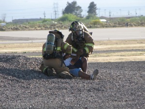 Simulated air crash casualty being treated.